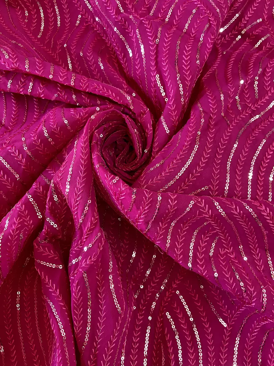 georgette fabric | pink georgette fabric | pink embroidered net fabric | Thread & Sequin Wavy Leaf Pattern Embroidery On Rani Pink Georgette Fabric