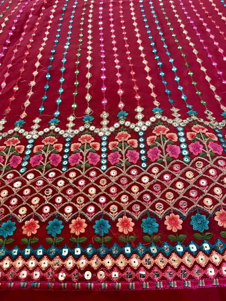 Multicoloured Stripe & Floral Pattern Thread & Mirror Embroidered on Red Georgette