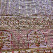 Heavy Antique Finish Sequin Embroidery in Traditional Mughal Pattern in Pink Georgette