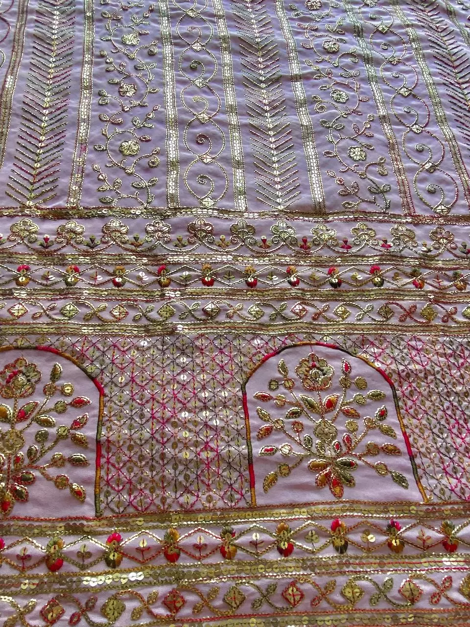 Heavy Antique Finish Sequin Embroidery in Traditional Mughal Pattern in Pink Georgette