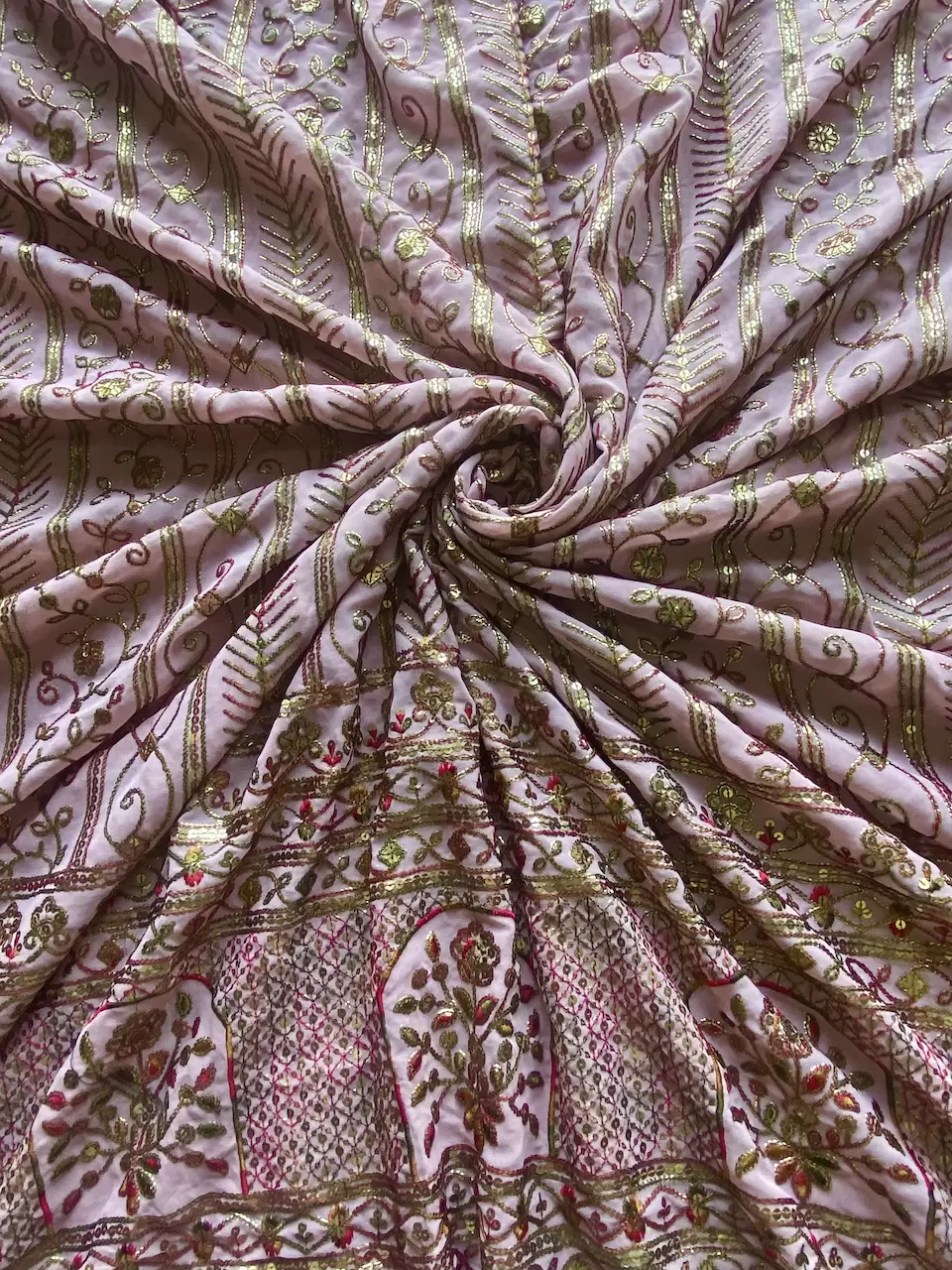 Heavy Antique Finish Sequin Embroidery in Traditional Mughal Pattern in Pink Georgette