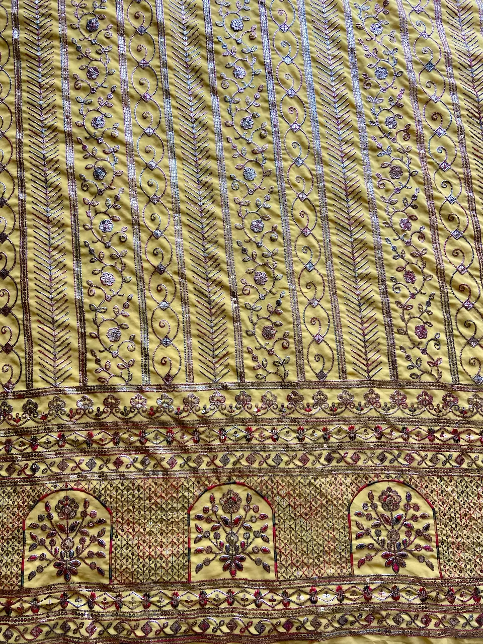 Heavy Antique Finish Sequin Embroidery in Traditional Mughal Pattern on Yellow Georgette