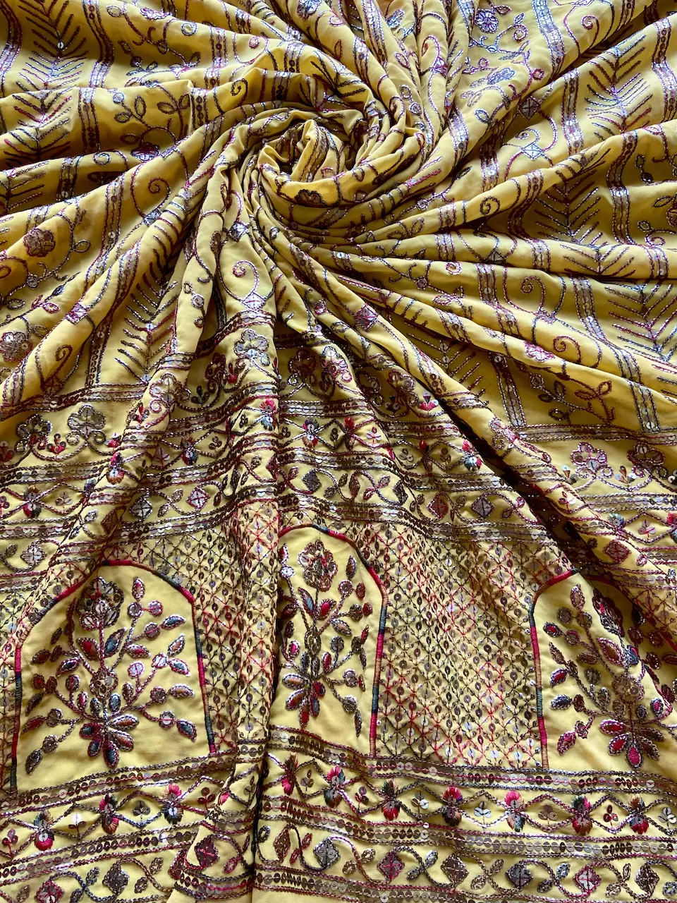 Heavy Antique Finish Sequin Embroidery in Traditional Mughal Pattern on Yellow Georgette