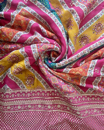 Multicoloured Traditional Printed Fabric With Heavy Border On Pure Chinon