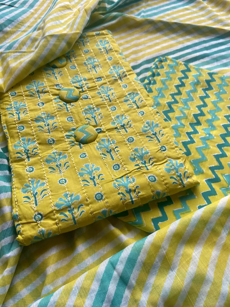 Bright Lemon Yellow Floral Printed Cotton Unstitched Suit Set With Zig Zag printed Bottom & Printed Cotton Dupatta