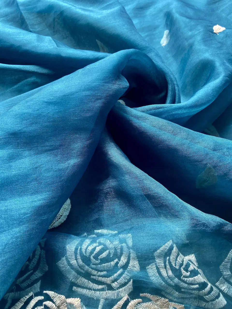 Peacock Blue Pure Organza Tissue Fabric With White Thread Rose Embroidery On Both Sides