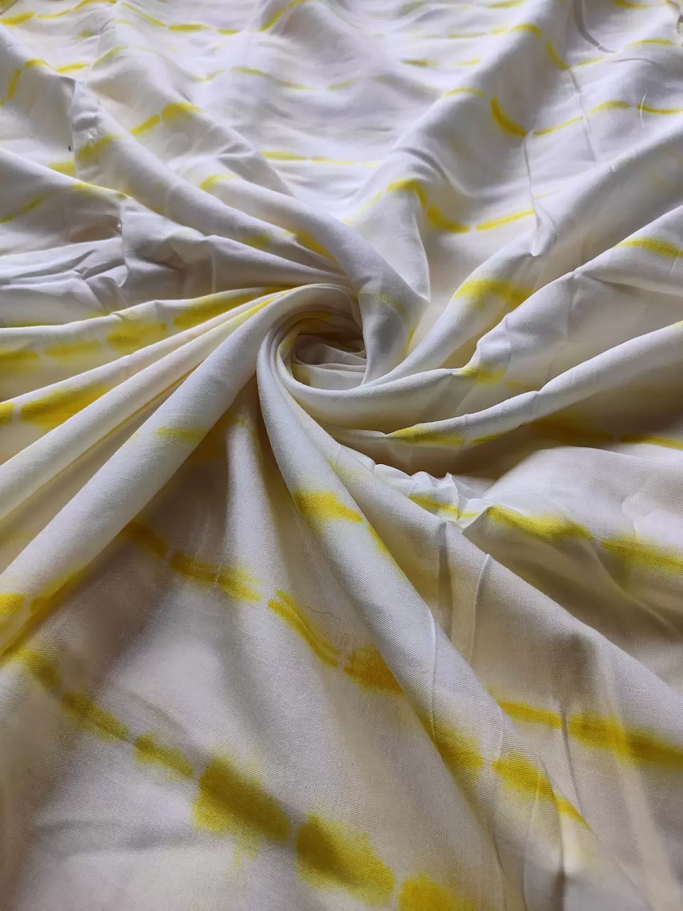 Yellow Tie Dye Shibori On Pure Modal Muslin Fabric