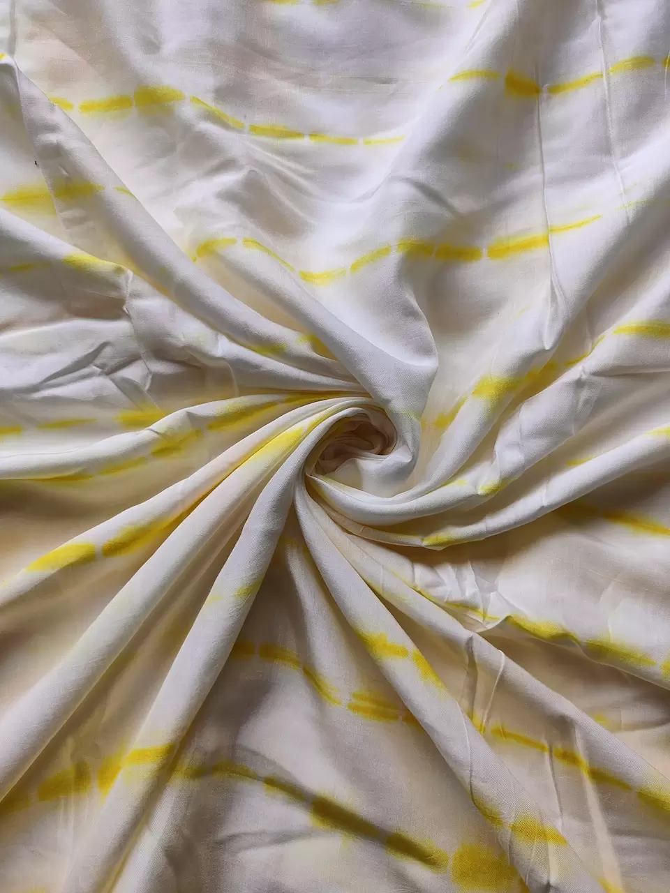 Yellow Tie Dye Shibori On Pure Modal Muslin Fabric