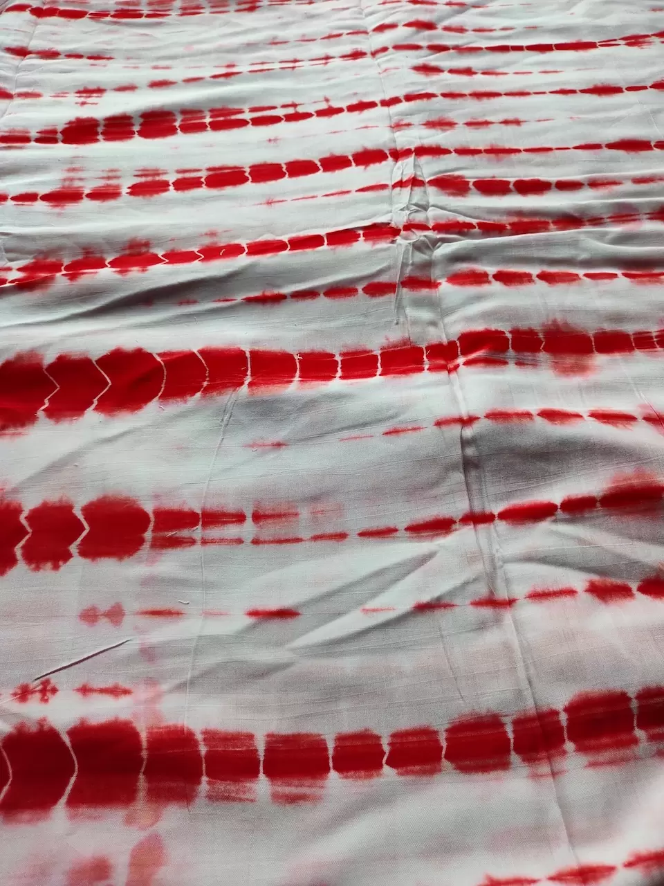 Red Tie Dye Shibori On Pure Modal Muslin Fabric
