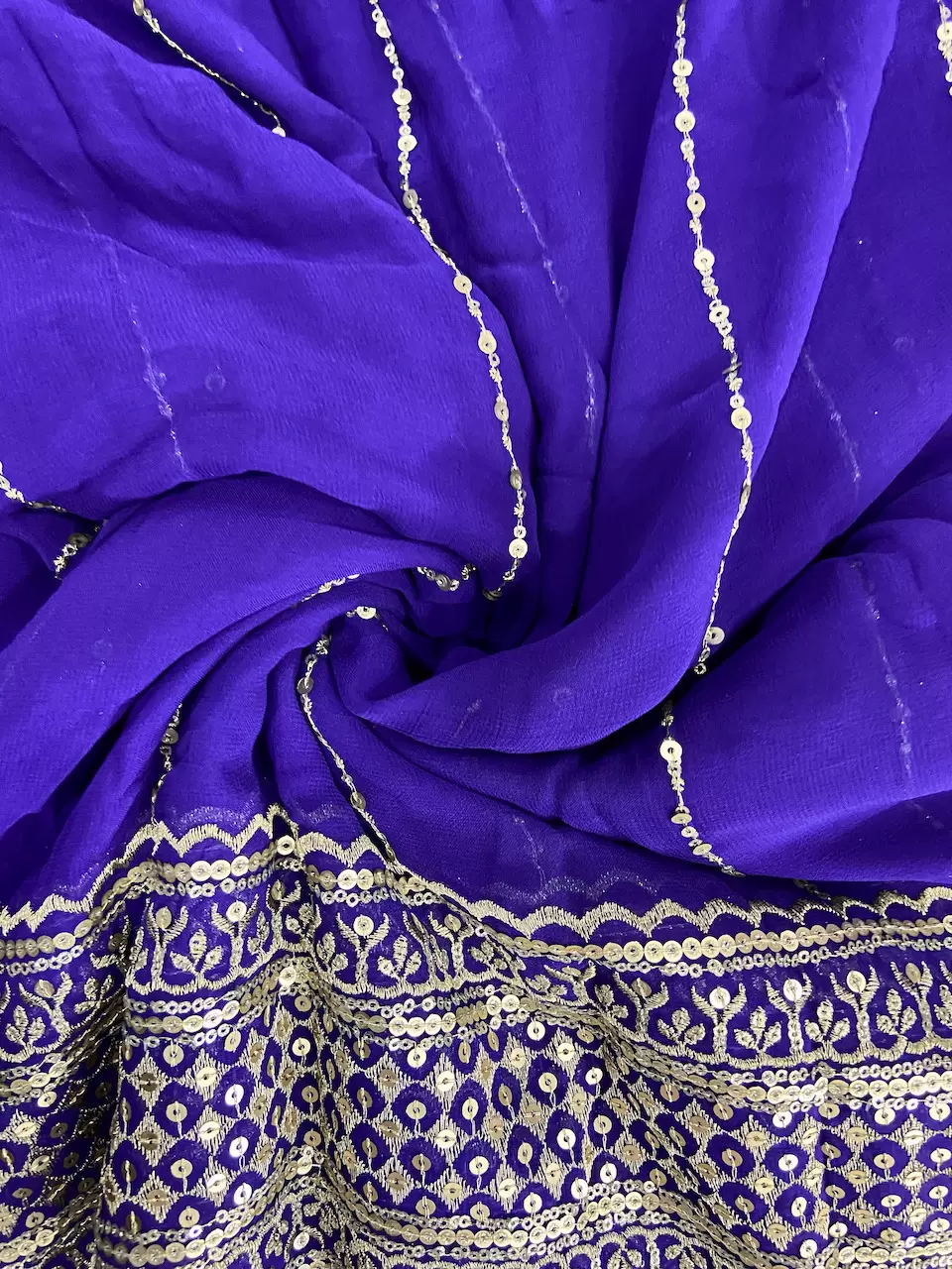 Gold Sequin Embroidery With Heavy Border On Purple Georgette Fabric