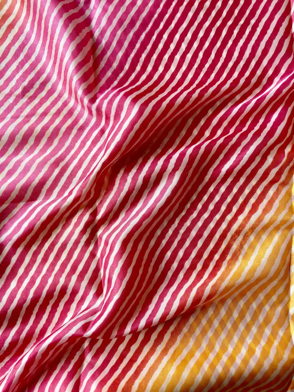 Rani Yellow Multi Leheriya Print On Chinnon Fabric