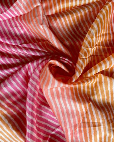 Pink Orange Peach Multi Leheriya Print On Chinnon Fabric