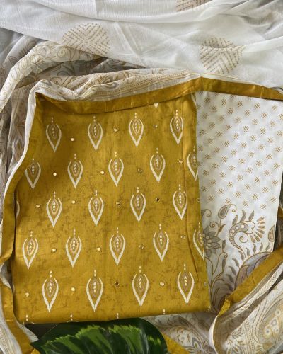 Ochre yellow pure cotton unstitched suit with off white chiffon dupatta