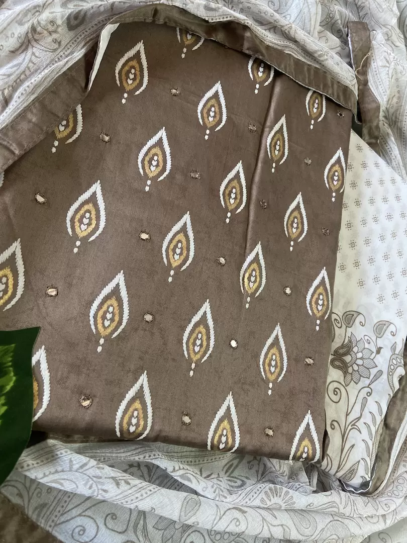 Ochre yellow pure cotton unstitched suit with off white chiffon dupatta