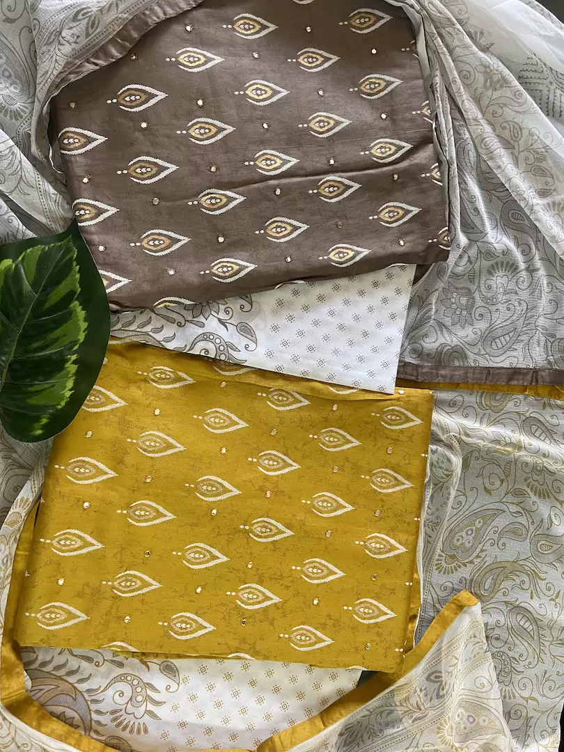 Ochre yellow pure cotton unstitched suit with off white chiffon dupatta