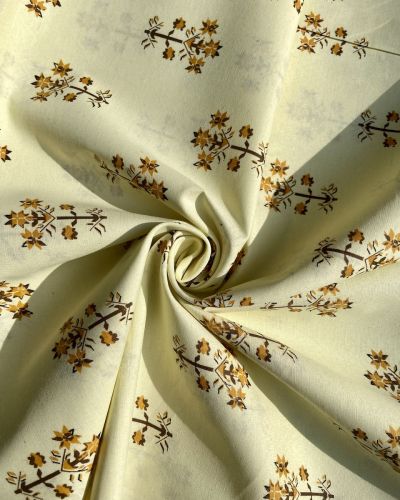 Creme Floral Printed On Pure Cotton Fabric