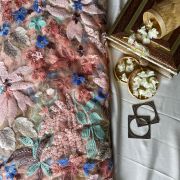 All Over Multicolour Floral Pattern Sequin Embroidery On Peach Net Fabric