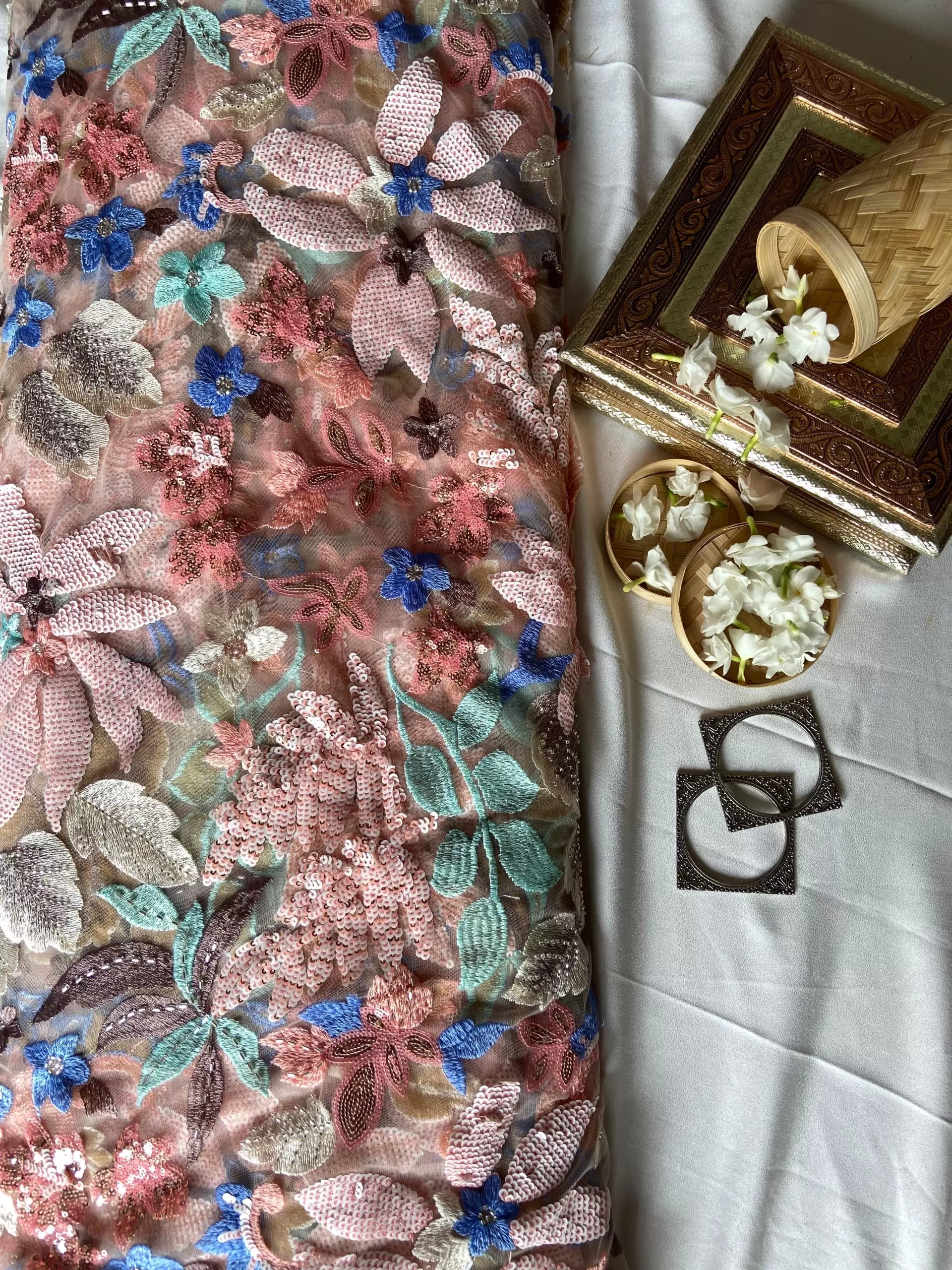 All Over Multicolour Floral Pattern Sequin Embroidery On Peach Net Fabric