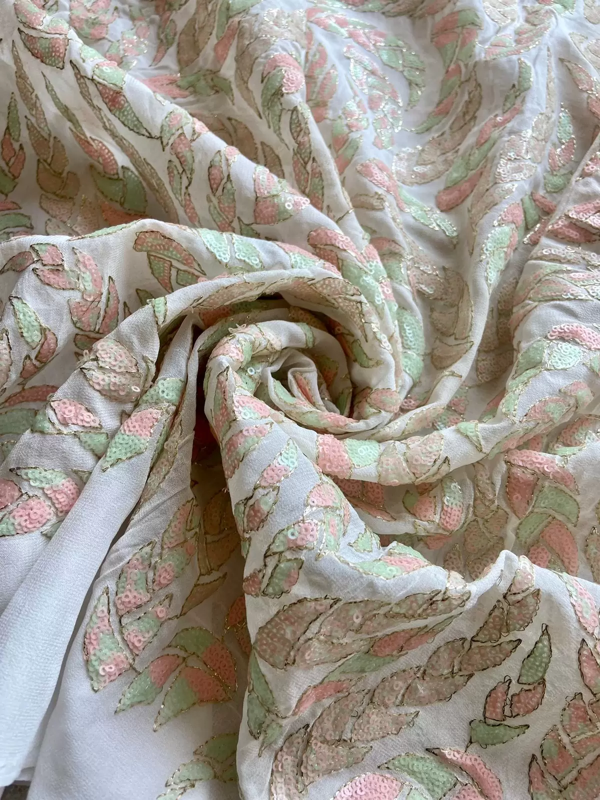 All Over Leaf Pattern Sequin Embroidery On White Georgette Fabric