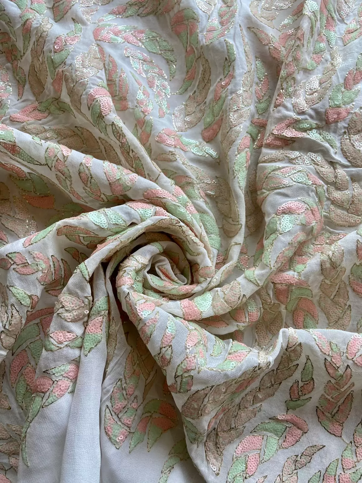 All Over Leaf Pattern Sequin Embroidery On White Georgette Fabric