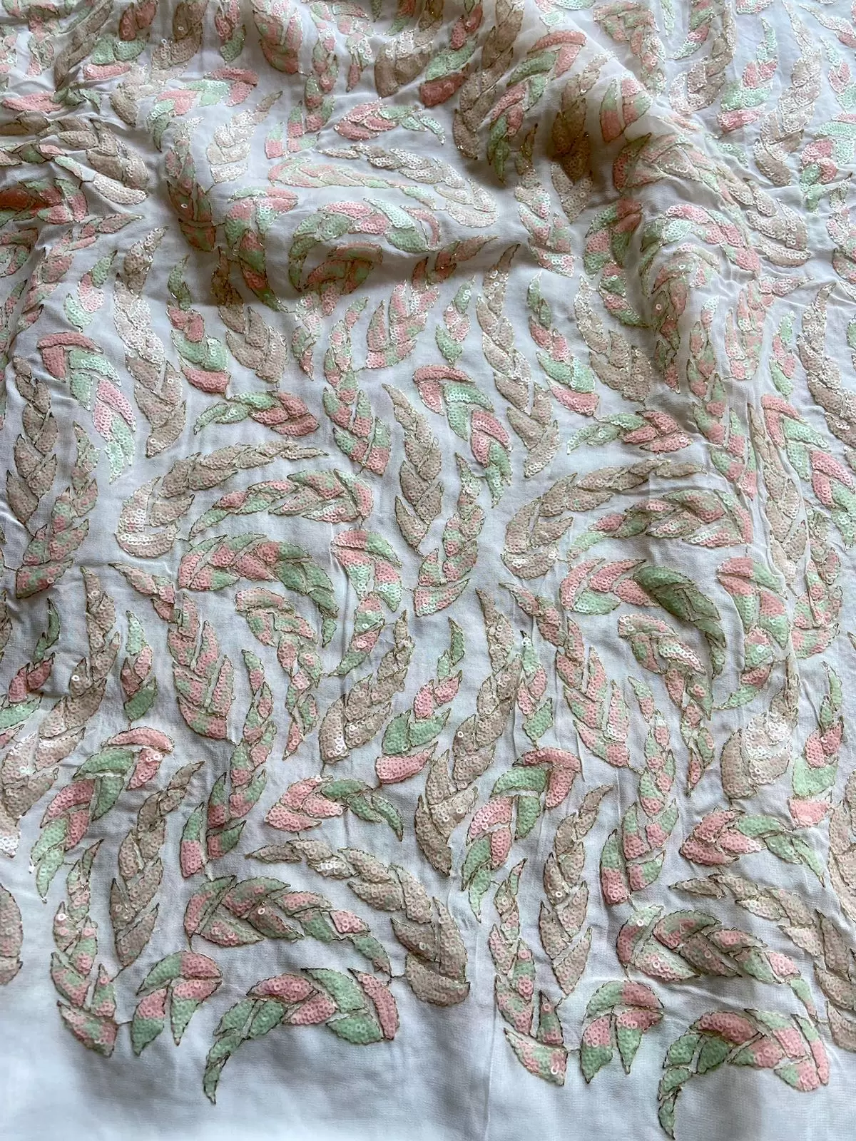 All Over Leaf Pattern Sequin Embroidery On White Georgette Fabric