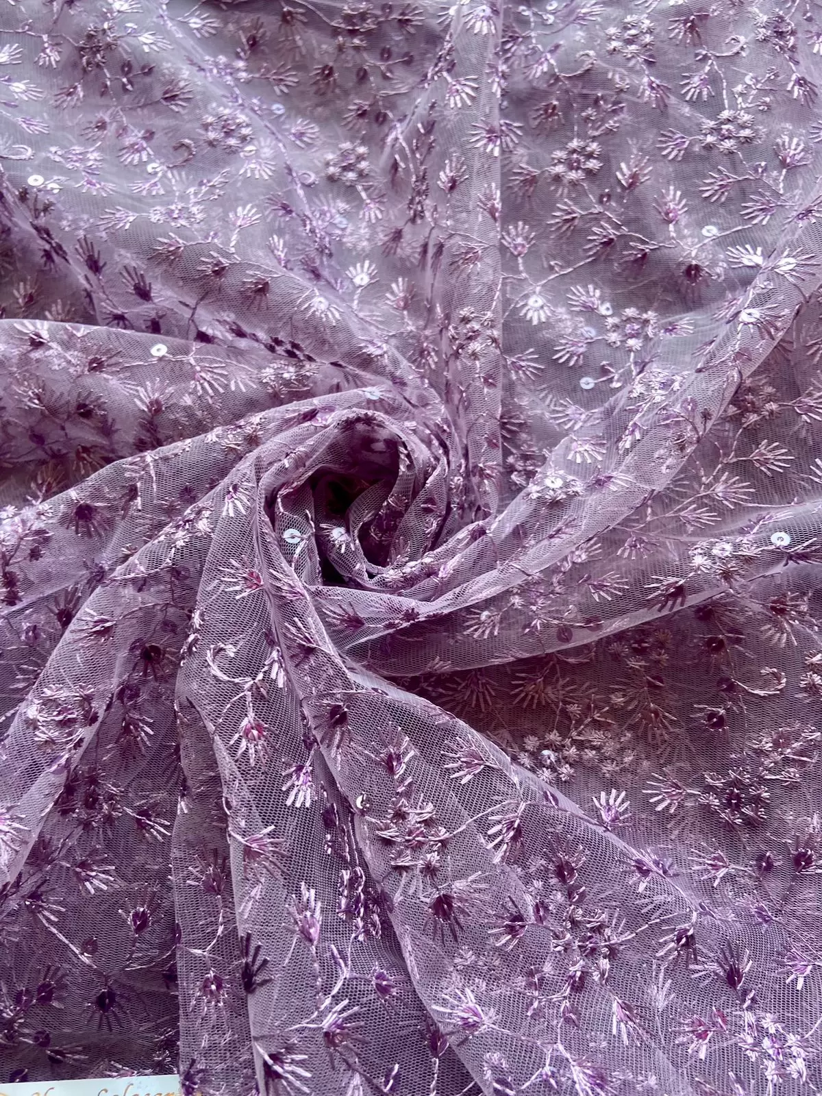 Mauve Purple Floral Pattern Thread Embroidery On Net Fabric