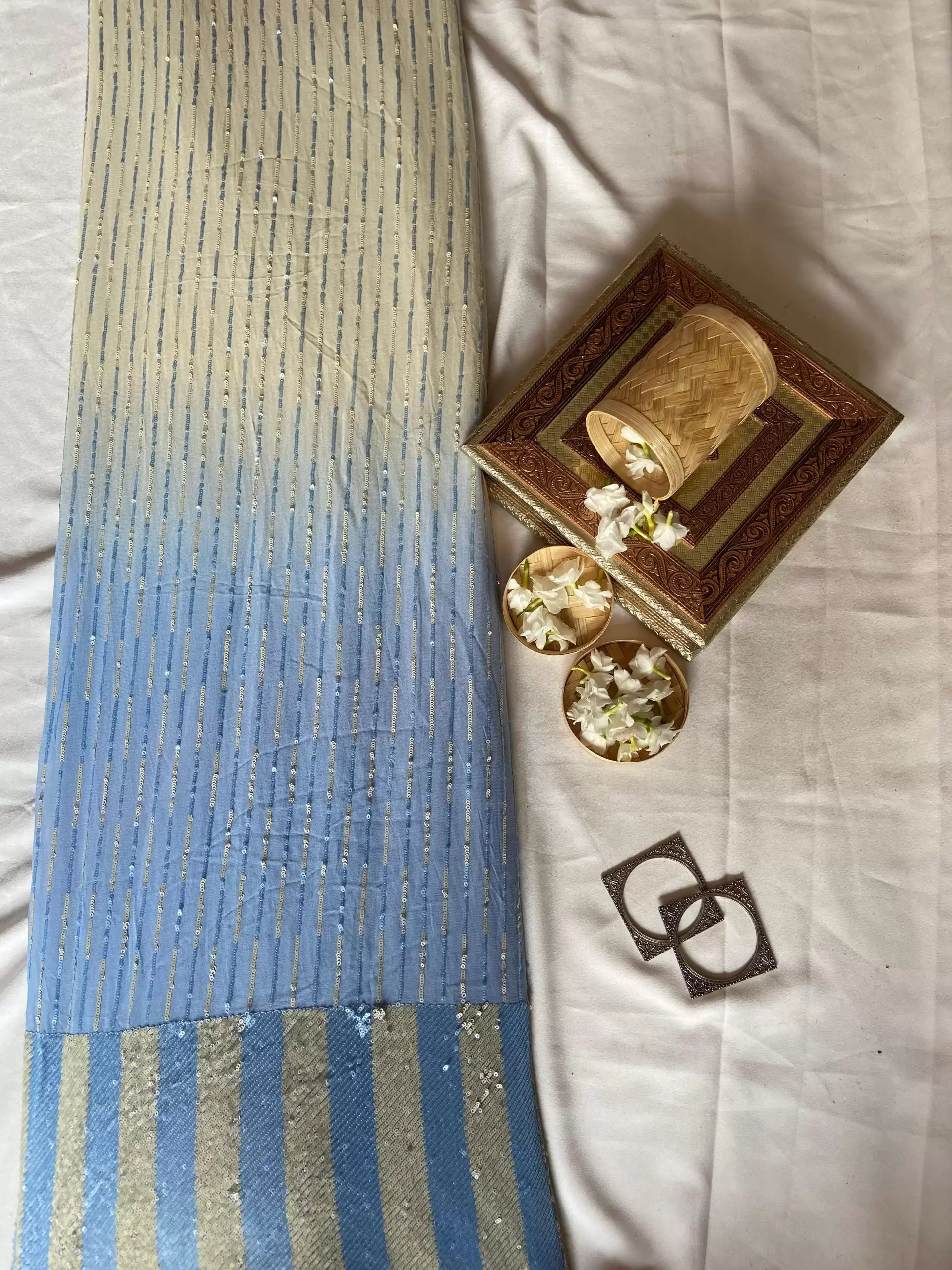 All Over Sequin Stripes & Heavy Sequin Work On Border On Creme To Powder Blue Shaded Pure Georgette Fabric