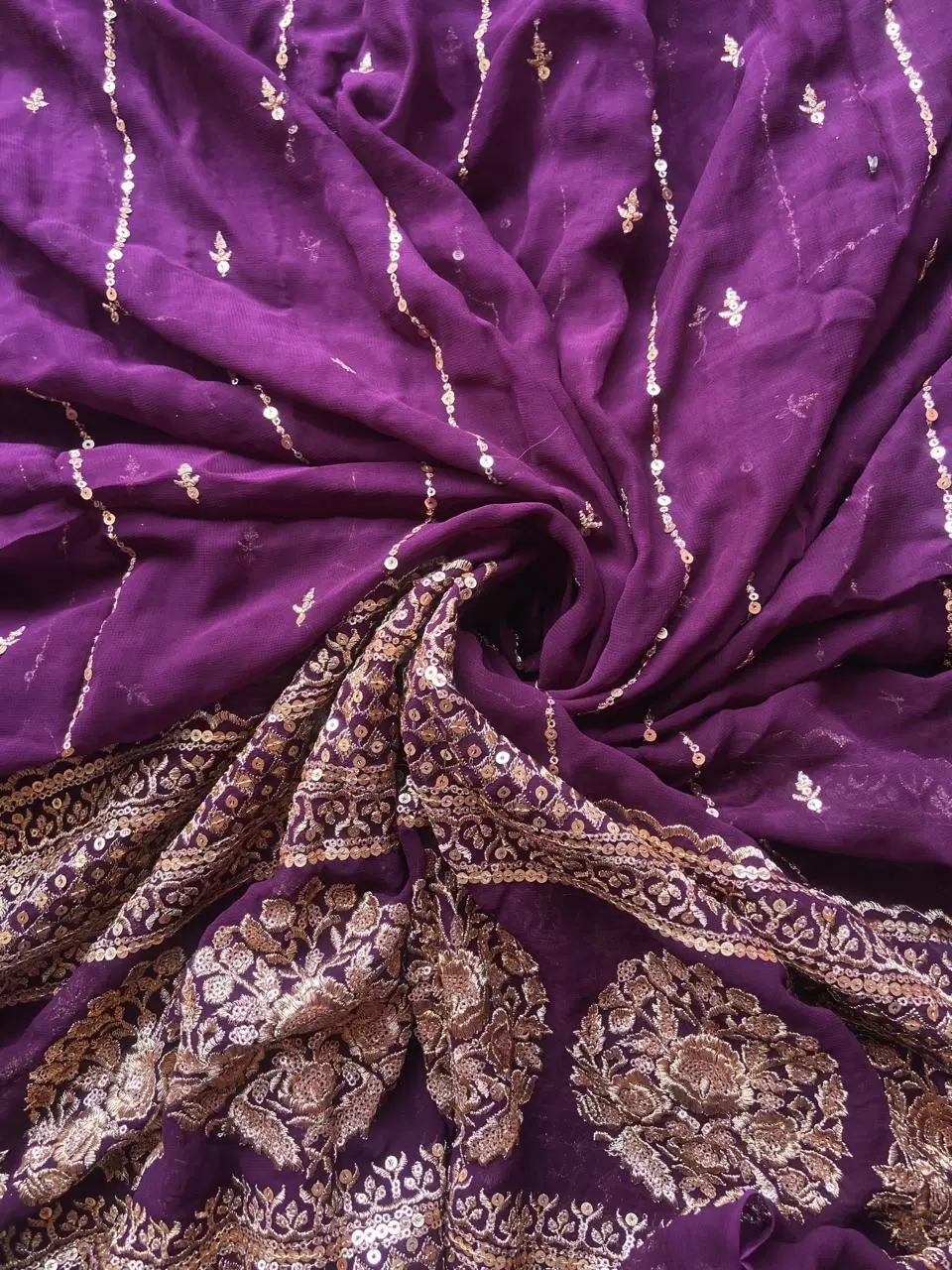 GOLD SEQUIN EMBROIDERY WITH HEAVY BORDER ON WINE GEORGETTE FABRIC