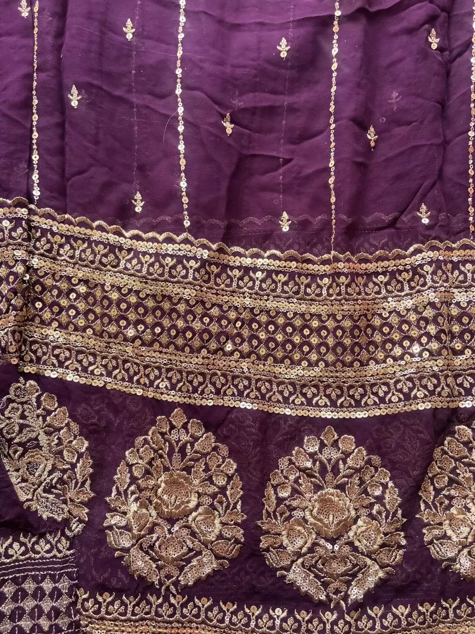 GOLD SEQUIN EMBROIDERY WITH HEAVY BORDER ON WINE GEORGETTE FABRIC