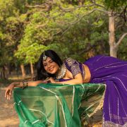 Maharani Lehenga in Purple Pure Georgette fabric with heavy border with Green Organza Dupatta