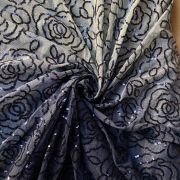 Heavy sequin work in floral pattern Pastel blue to navy blue shaded net fabric