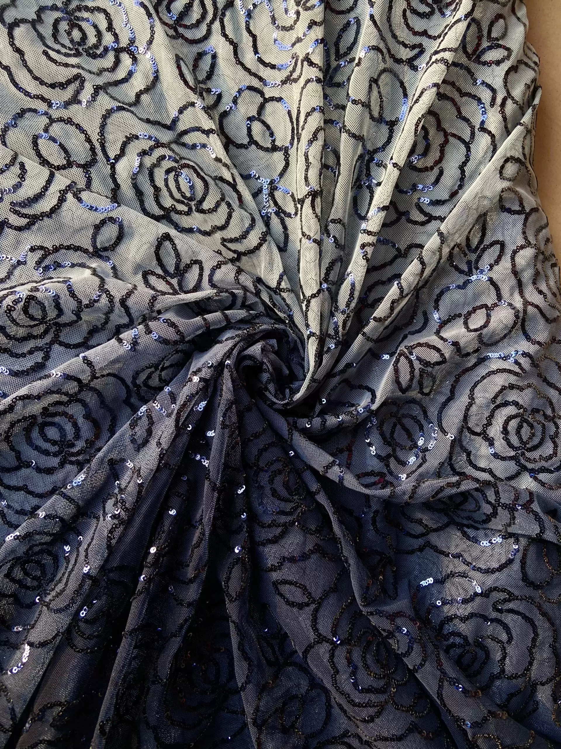 Heavy sequin work in floral pattern Pastel blue to navy blue shaded net fabric
