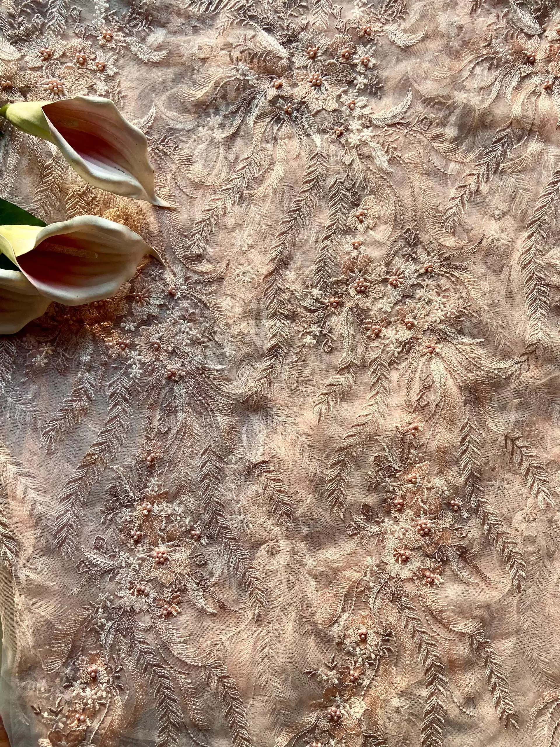 All over sequin & thread work embroidery on peach net fabric