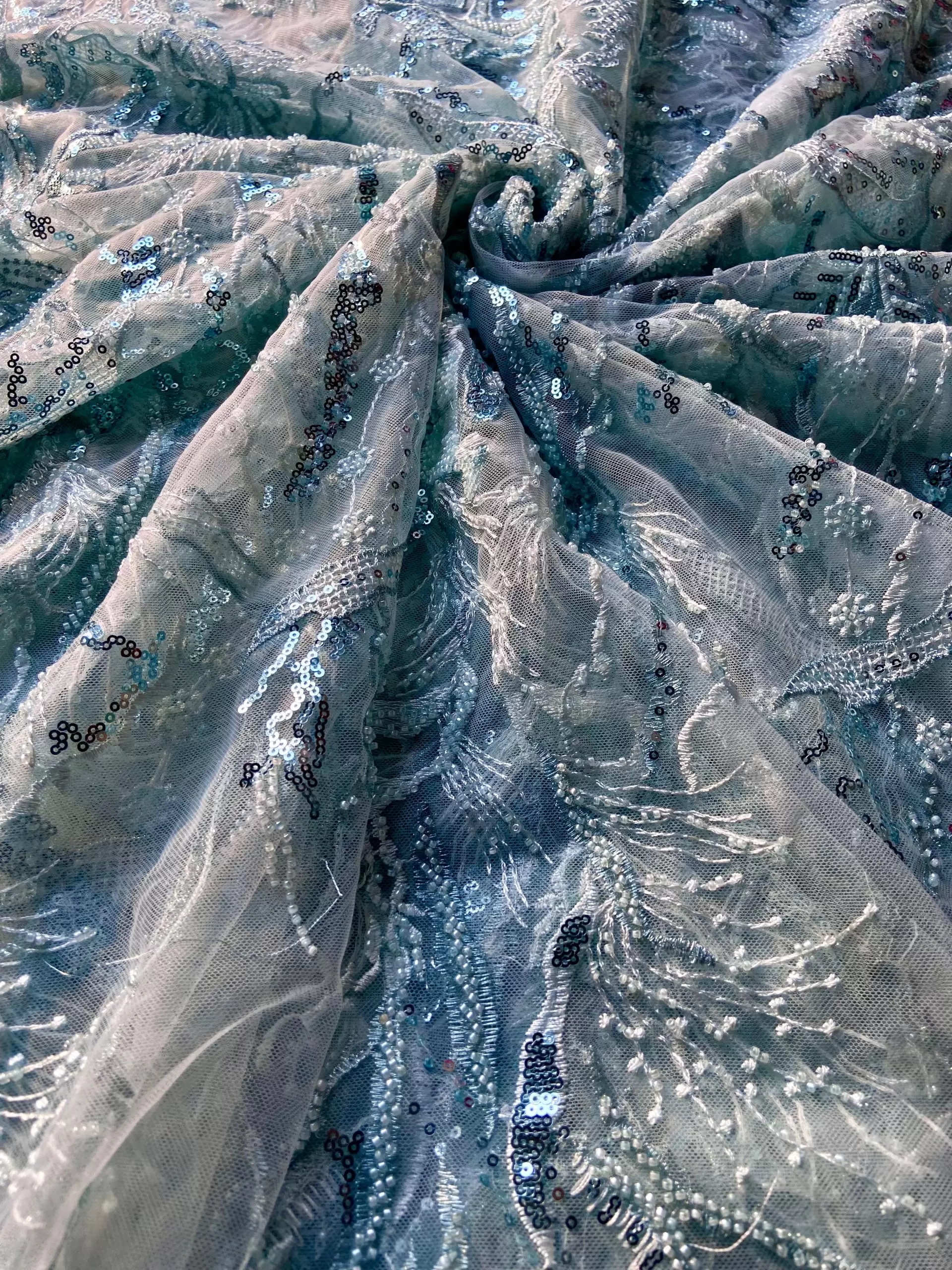 All over sequin & thread work embroidery on powder blue net fabric