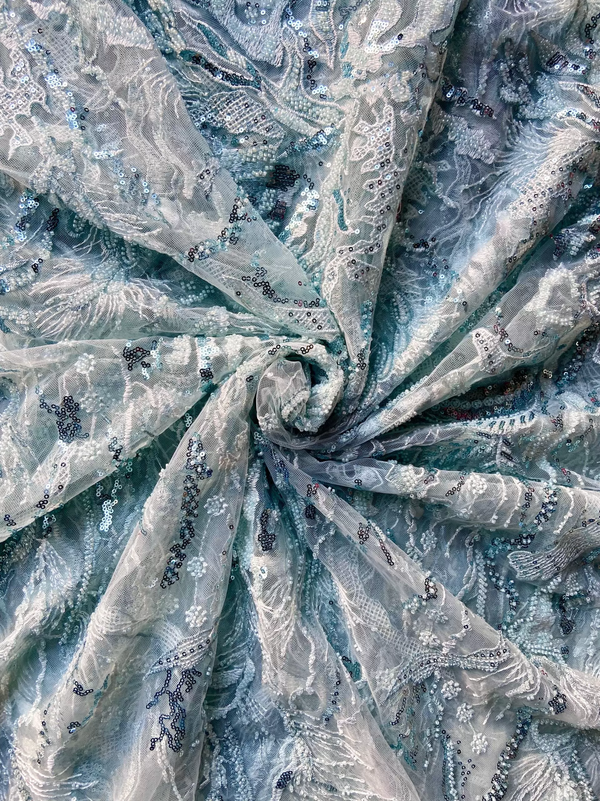 All over sequin & thread work embroidery on powder blue net fabric