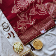 Maroon silk saree with golden print work