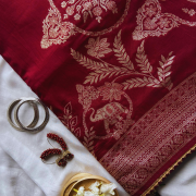 Maroon silk saree with golden print work