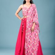 Gulnar Flared Lehenga and Blouse set with Shrug style Dupatta and Tassel Detailings.