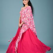 Gulnar Flared Lehenga and Blouse set with Shrug style Dupatta and Tassel Detailings.