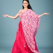 Gulnar Flared Lehenga and Blouse set with Shrug style Dupatta and Tassel Detailings.