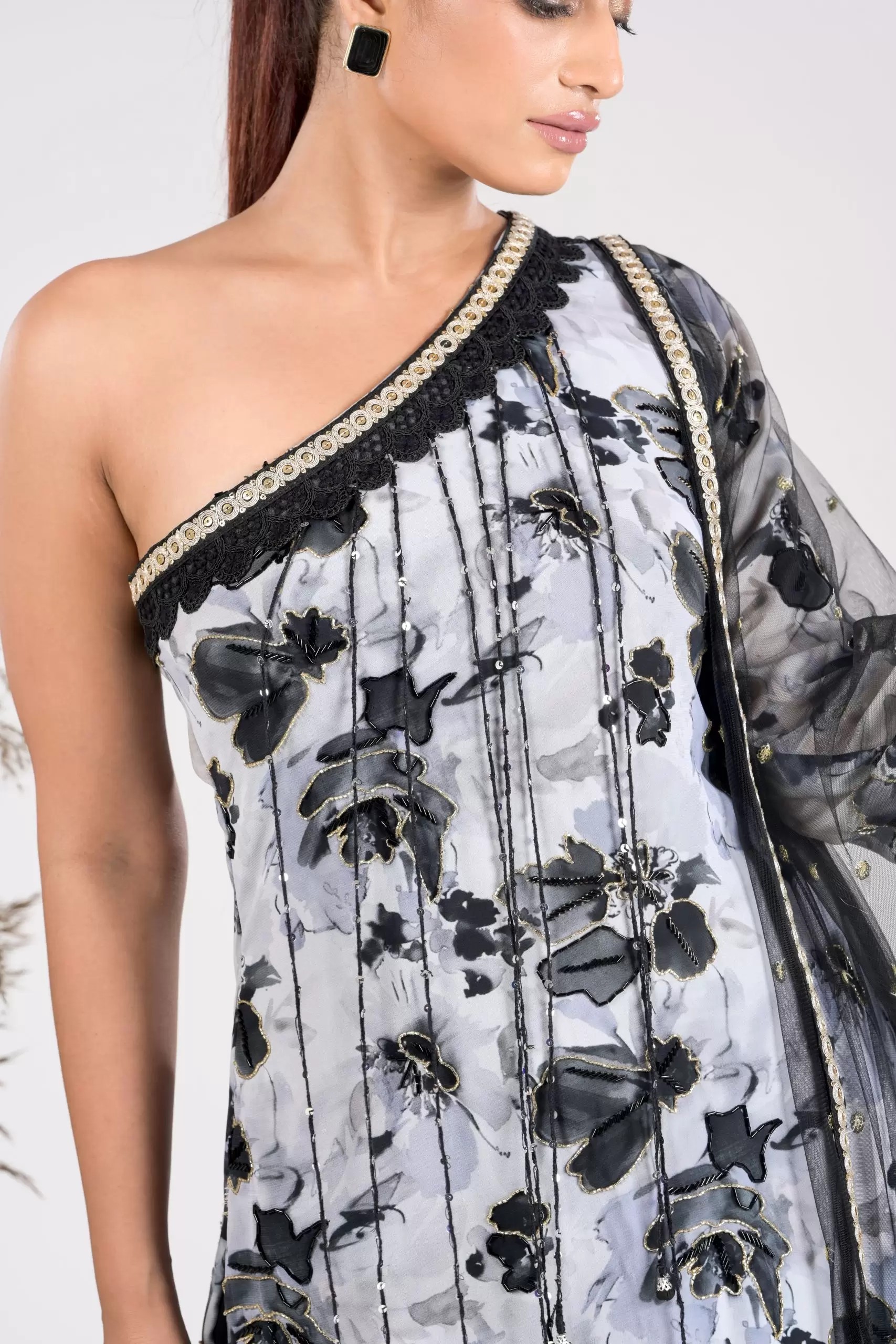 Noor One Shoulder Kurta with Thread Tassels Detailling and Pants set with Net Dupatta