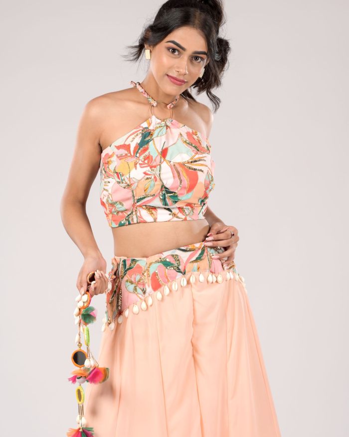 Rangrez Hand embroidered Crop Top and Kali Pallazo with ring and Shell Detailing Paired with Dupatta.