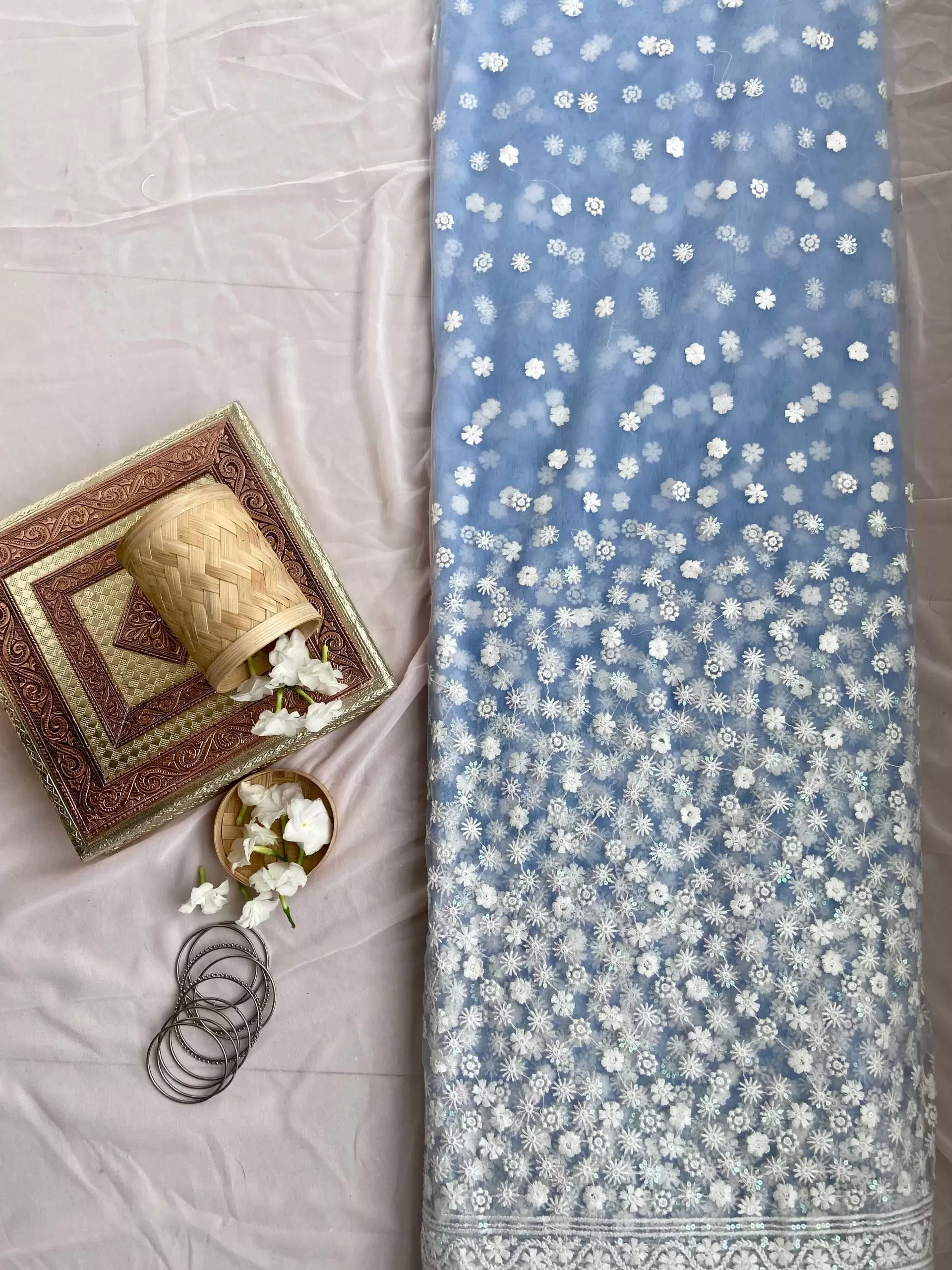 All over floral white thread work on cyan blue big width net fabric