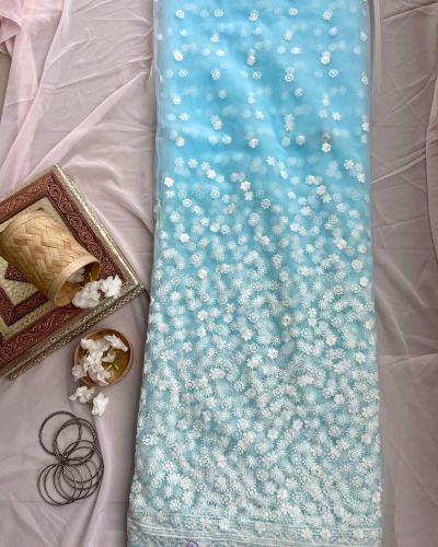 All over floral white thread work on azure sky blue big width net fabric