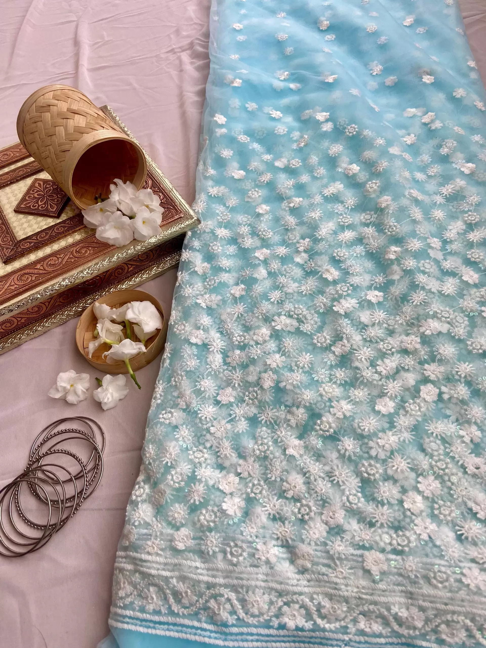 All over floral white thread work on azure sky blue big width net fabric