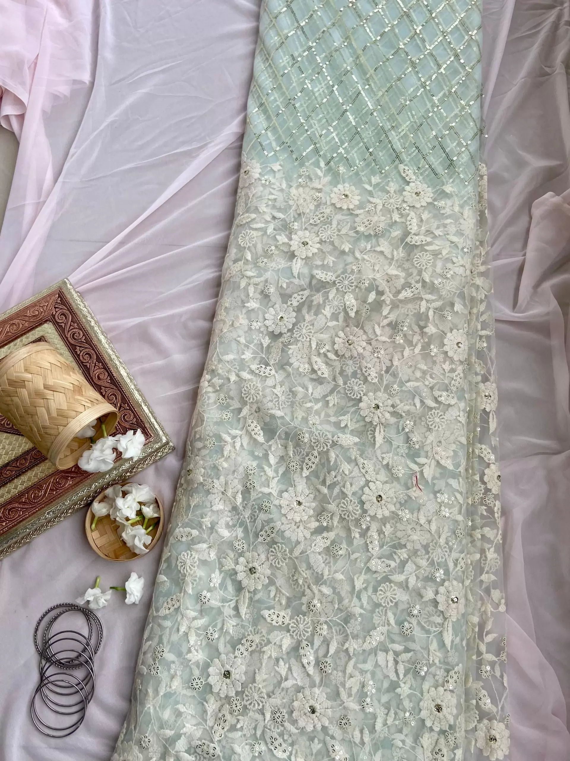 White floral thread and sequin on powder blue big width net fabric