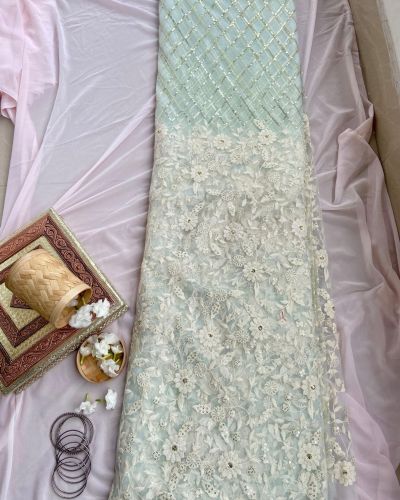 White floral thread and sequin on powder blue big width net fabric