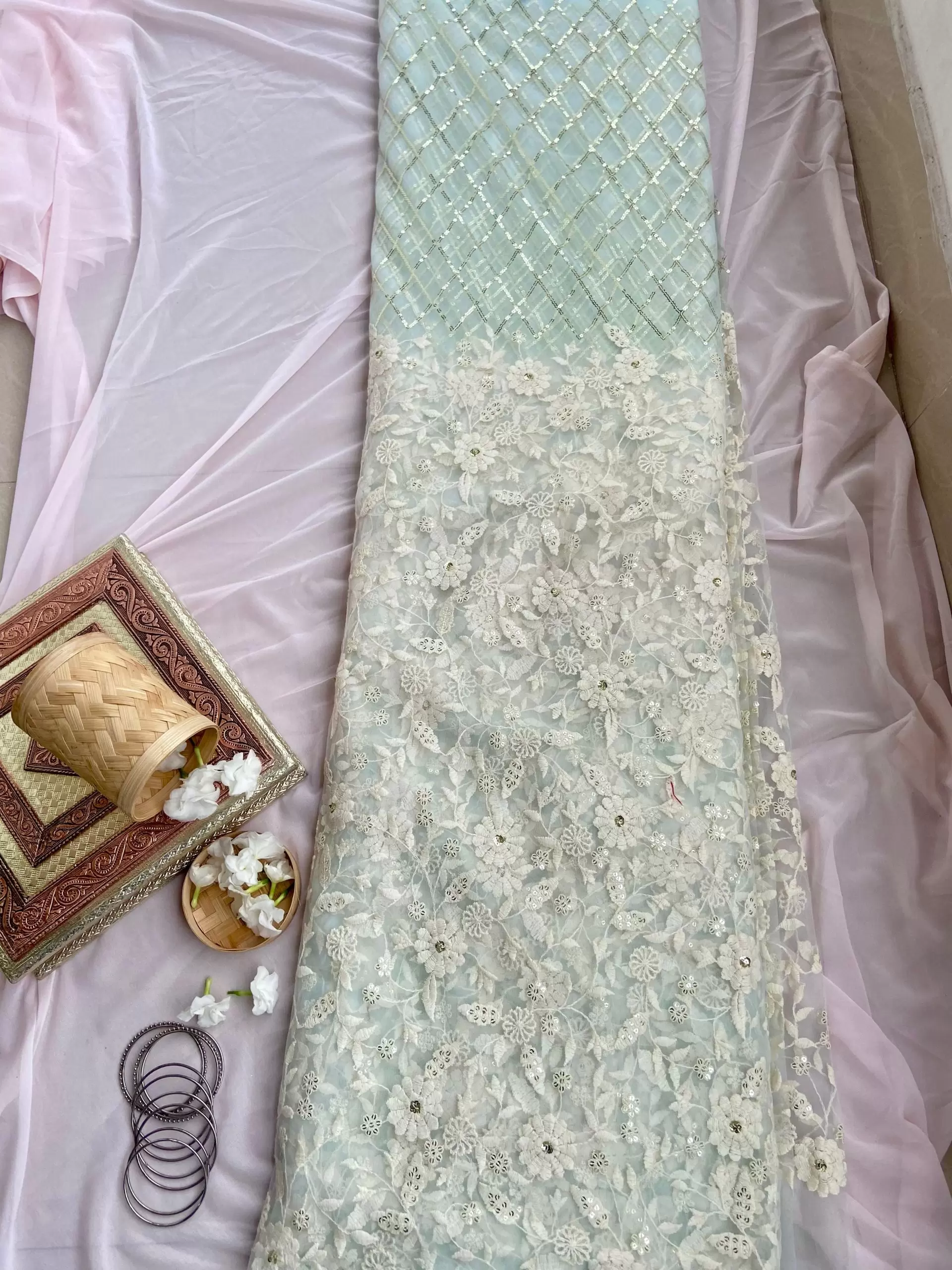 White floral thread and sequin on powder blue big width net fabric