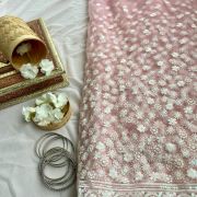 All over floral white thread work on blush pink big width net fabric