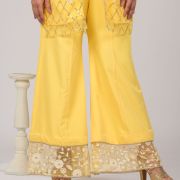 Pastel yellow Co ord set with Bell Bottom Pants and cut detailling in the Front